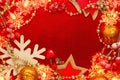 Red and golden background with christmas decorations and garlands. Abstract Xmas pattern. Copy space Royalty Free Stock Photo
