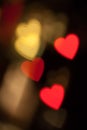 Red and golden heart bokeh black background photo Royalty Free Stock Photo