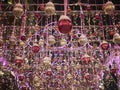 Red and golden new year spheres with illumination. New year street decoration in the evening Royalty Free Stock Photo