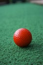 Red Golfball on the Green