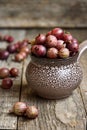 Red gooseberries in ceramic bowl Royalty Free Stock Photo