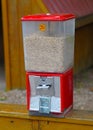 Red Grain dispenser for hand feeding Royalty Free Stock Photo