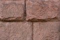 Red granite bricks wall texture background Royalty Free Stock Photo