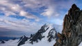 Red granite rock needles with a great view of Mont Blanc in the background in the French Alps Royalty Free Stock Photo
