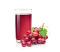 Red grape juice with grape cluster Royalty Free Stock Photo