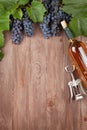 Red grape, wine bottle and corkscrew Royalty Free Stock Photo