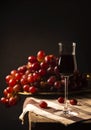 Red grape wine on wooden table and black background. home made nature wine with fresh red grapes.