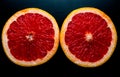 red grapefruit on black background Royalty Free Stock Photo