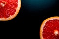 red grapefruit on black background Royalty Free Stock Photo