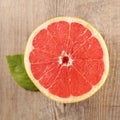Red grapefruit and leaf Royalty Free Stock Photo