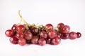 Red grapes with stalks isolated on white background Royalty Free Stock Photo