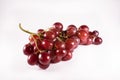 Red grapes with stalks isolated on white background Royalty Free Stock Photo