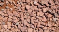 Red gravel over sand texture background Royalty Free Stock Photo