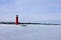 The Red Great Lakes Lighthouse on the Pier at Kenosha Wisconsin Royalty Free Stock Photo