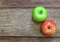 Red and green apple fruit on wood