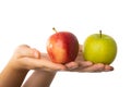 Red and green apple held in female hands