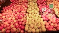 Red and green apples on display supermarket bulk Royalty Free Stock Photo