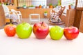 Red and green apples on garden table Royalty Free Stock Photo