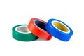 Red, green and blue adhesive insulating electrical tape reels stack isolated on white background. Royalty Free Stock Photo