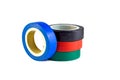 Red, green and blue adhesive insulating electrical tape reels stack isolated on white background. Royalty Free Stock Photo