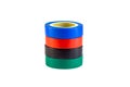 Red, green and blue adhesive insulating electrical tape reels stack isolated on white background. Royalty Free Stock Photo