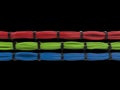 Red, green and blue cables tied with black zipties Royalty Free Stock Photo