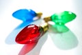 Red Green and Blue Christmas Lightbulbs on White Background Royalty Free Stock Photo