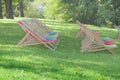 Red, Green and Blue coloured Folded Deck Chairs