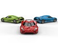 Red, green and blue sublime sports cars - back to back