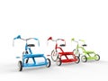 Red, green and blue tricycles - back view