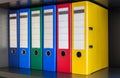 Red, green, blue and yellow office folders Royalty Free Stock Photo