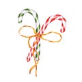 Red, green candy canes with gold bow. Christmas stick, caramel cane with striped ornate, Xmas sugar lollipop. New year present,