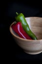 Red and green chilli on a black background Royalty Free Stock Photo