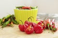 Red and green chilli peppers on a chopping board Royalty Free Stock Photo