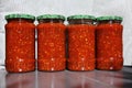 Red and green chilli peppers sauce preserved in vinegar Royalty Free Stock Photo