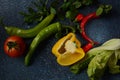 Red and green chilly peppers and half of yellow bell-pepper Royalty Free Stock Photo