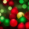 Red and green Chrismas balls in light bokeh blurred background. Christmas blue decorations Royalty Free Stock Photo