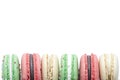 Red and green christmas macaroons isolated on white Royalty Free Stock Photo