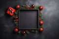Red and green Christmas ornaments garland frame and gift box on blackboard, Christmas background. Generative AI