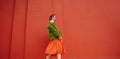 Red and green cloth conceptual horizontal composition. Girl long banner wall