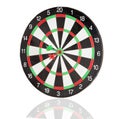 Red and green darts punctured in the center Royalty Free Stock Photo