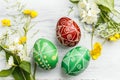 Red and green Easter pysanka eggs with flowers