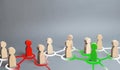 red and green figures of people influence on their surroundings people through communication and social networks. Pressure Royalty Free Stock Photo