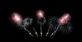 Red and green fireworks display  on black sky for celebration and anniversary Royalty Free Stock Photo