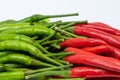 Red and green hot chili peppers isolated on white background. Royalty Free Stock Photo