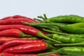 Red and green hot chili peppers isolated on white background. Royalty Free Stock Photo