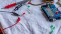 Red and green LED lights being shown in use as part of a microcontroller build