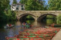 Red and Green Moored Rowing Boats Along a Yorkshire River. Royalty Free Stock Photo