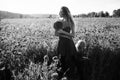 Red and green, mother and child in poppy field Royalty Free Stock Photo