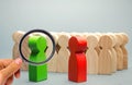 Red and green people stand in front of a crowd. Two opponents. Conflict of interest. Dispute. Search for compromises. Social Royalty Free Stock Photo